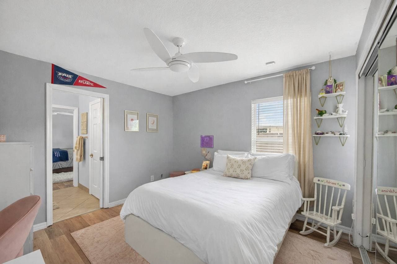 Bedroom with pink curtains