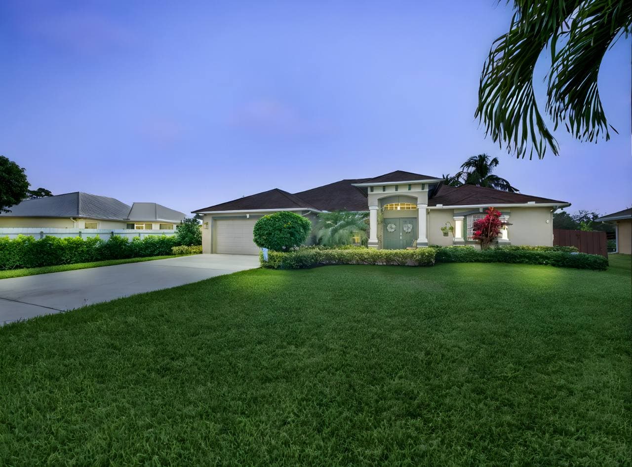 The Grande Oasis exterior at dusk